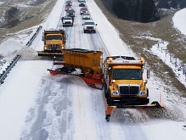 snow plows on the road